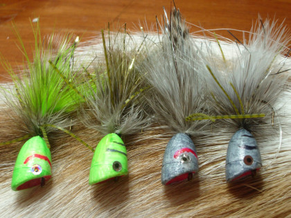 Can't wait for the lakes to open up and toss some poppers...tied up these guys for a friend